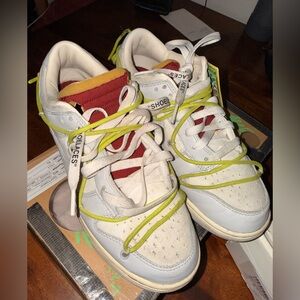 Nike Kids White Sneakers with Red and Yellow Accents